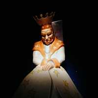 A crowned sculpture of the King from The Little Prince, wearing a star-covered robe at the museum in Hakone, Japan.