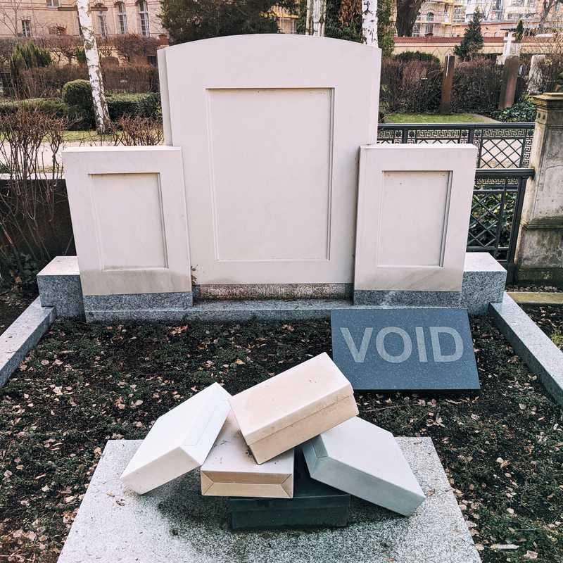 A tombstone with the word 'void' in capital letters